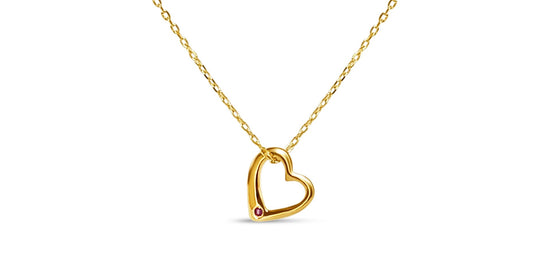 gold plated heart pendant with ruby gemstone on matching gold plated chain necklace