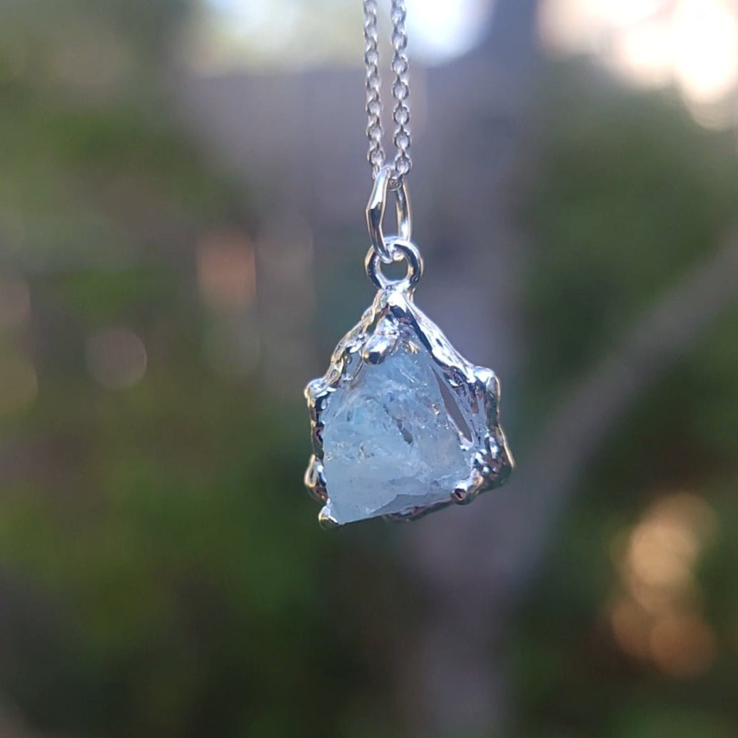 A Pendant Necklace Made of Raw, Natural Aquamarine Silver with a Branch Setting