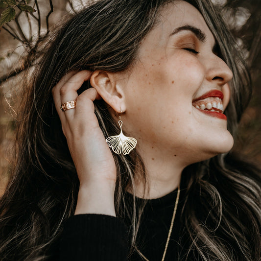 Model wearing in side view - Adia Ginkgo Leaf Dangle Earrings