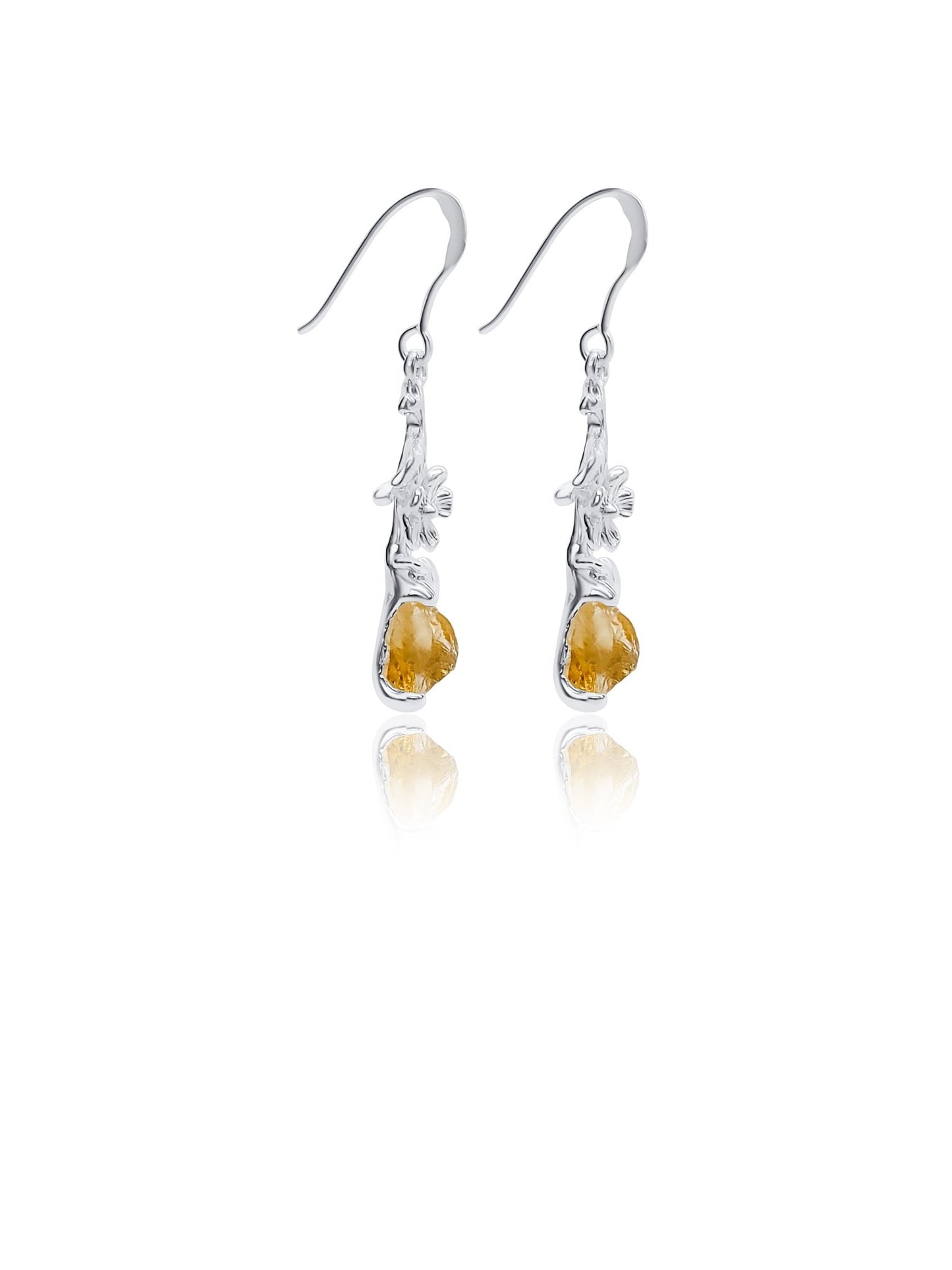 side view raw citrine with silver flowers on dangle earrings