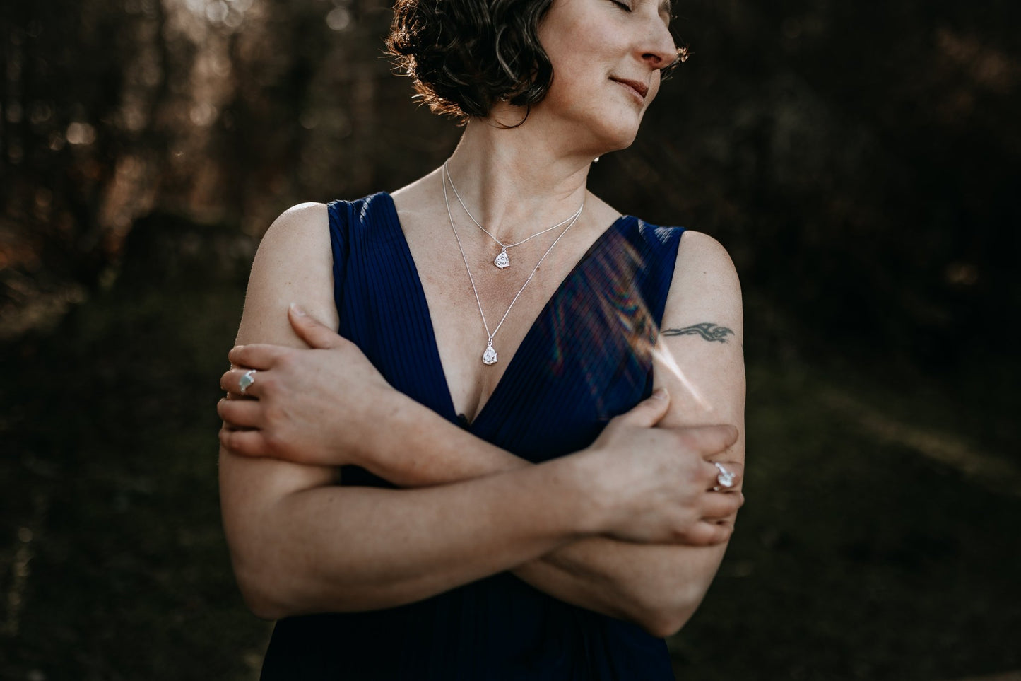 model wearing 2 sterling silver Herkimer diamond necklaces