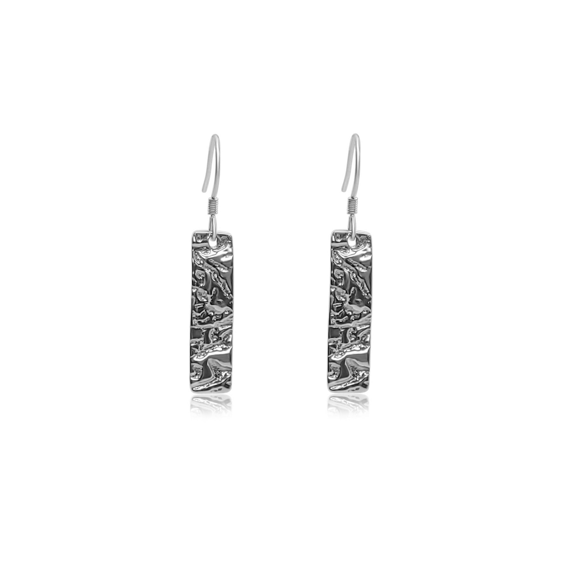 sterling silver drop earrings with thin rectangle pendant with a captivating driftwood texture