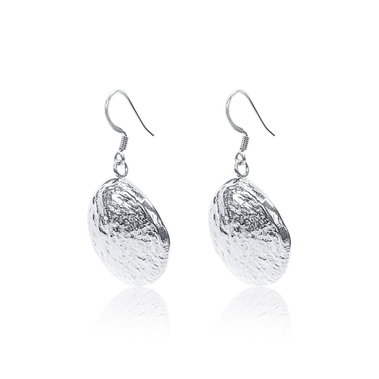 side angle view of sterling silver shell earrings with natural shell texture
