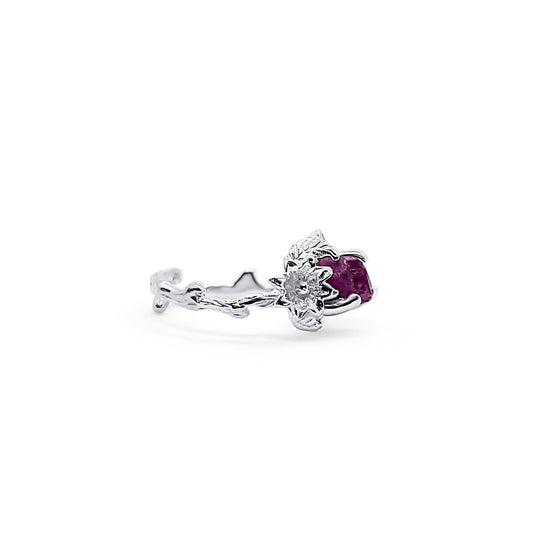 One-of-a-kind, handmade, adjustable silver ring with flower detail, featuring raw ruby and zircon.