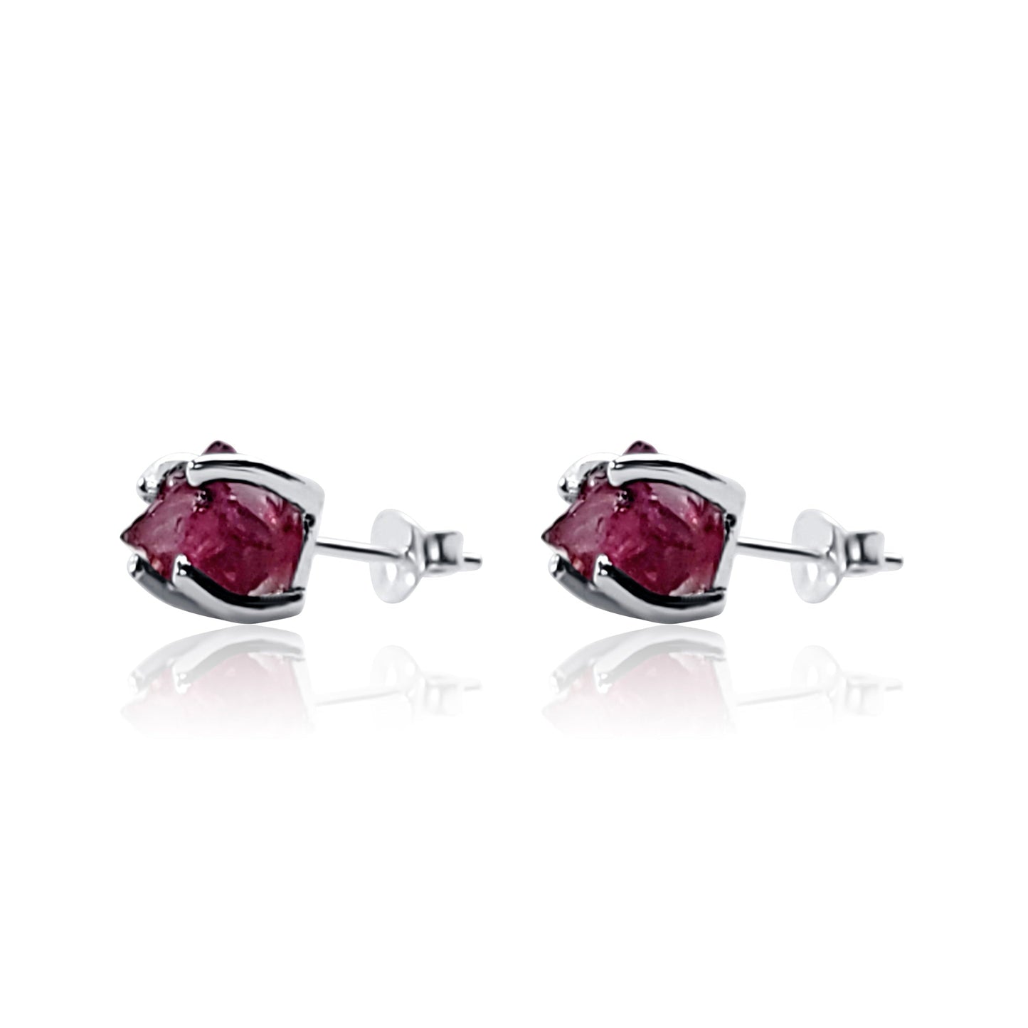side view of raw garnet crystal silver stud earrings with prong setting