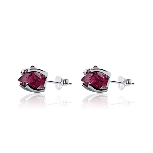 side view of raw garnet crystal silver stud earrings with prong setting