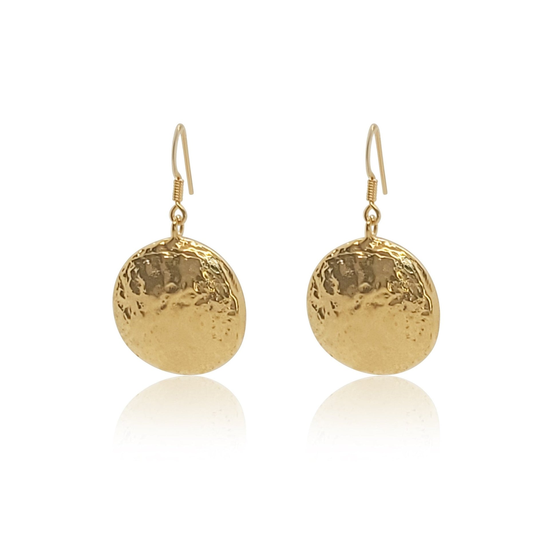 gold Talia dangle shell earrings. Circular gold shell earrings on french ear wires.
