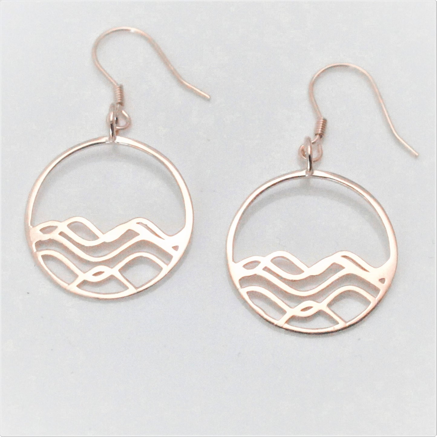 18k rose gold plated 925 sterling silver petite high tide circle earrings on a white background