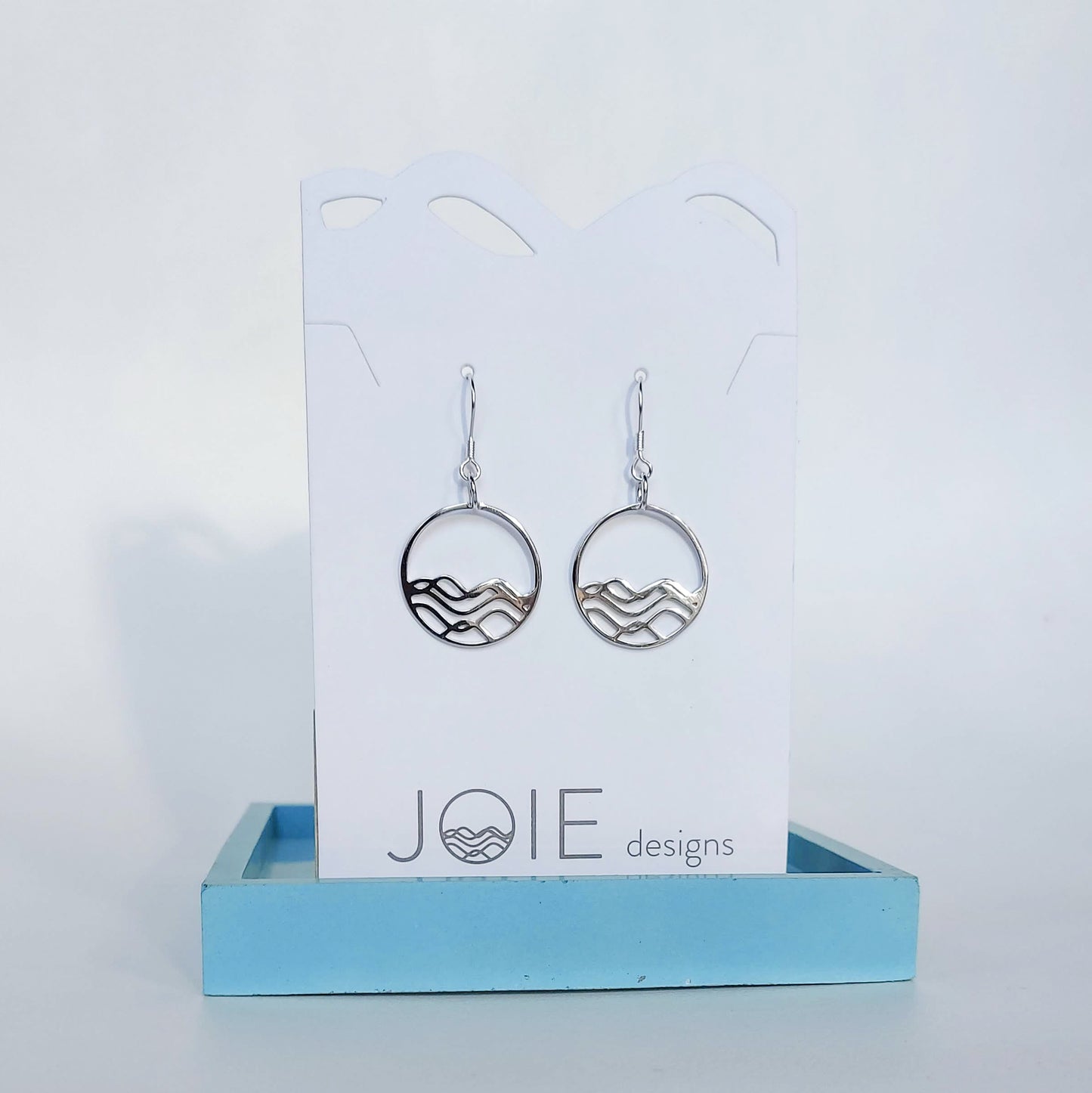 ocean inspired jewelry, 925 sterling silver high tide in the circle shape dangle earring on a jewelry card