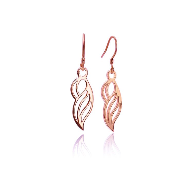 18k rose gold vermeil earrings on french ear wires. Organic form that resembles a woman, a wave, or a wing.