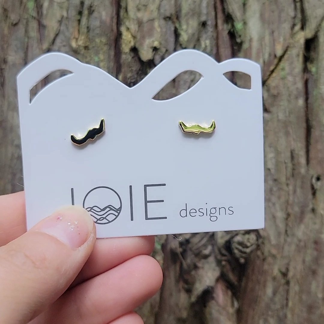 little gold plated sterling silver Savary island stud earrings on jewelry card