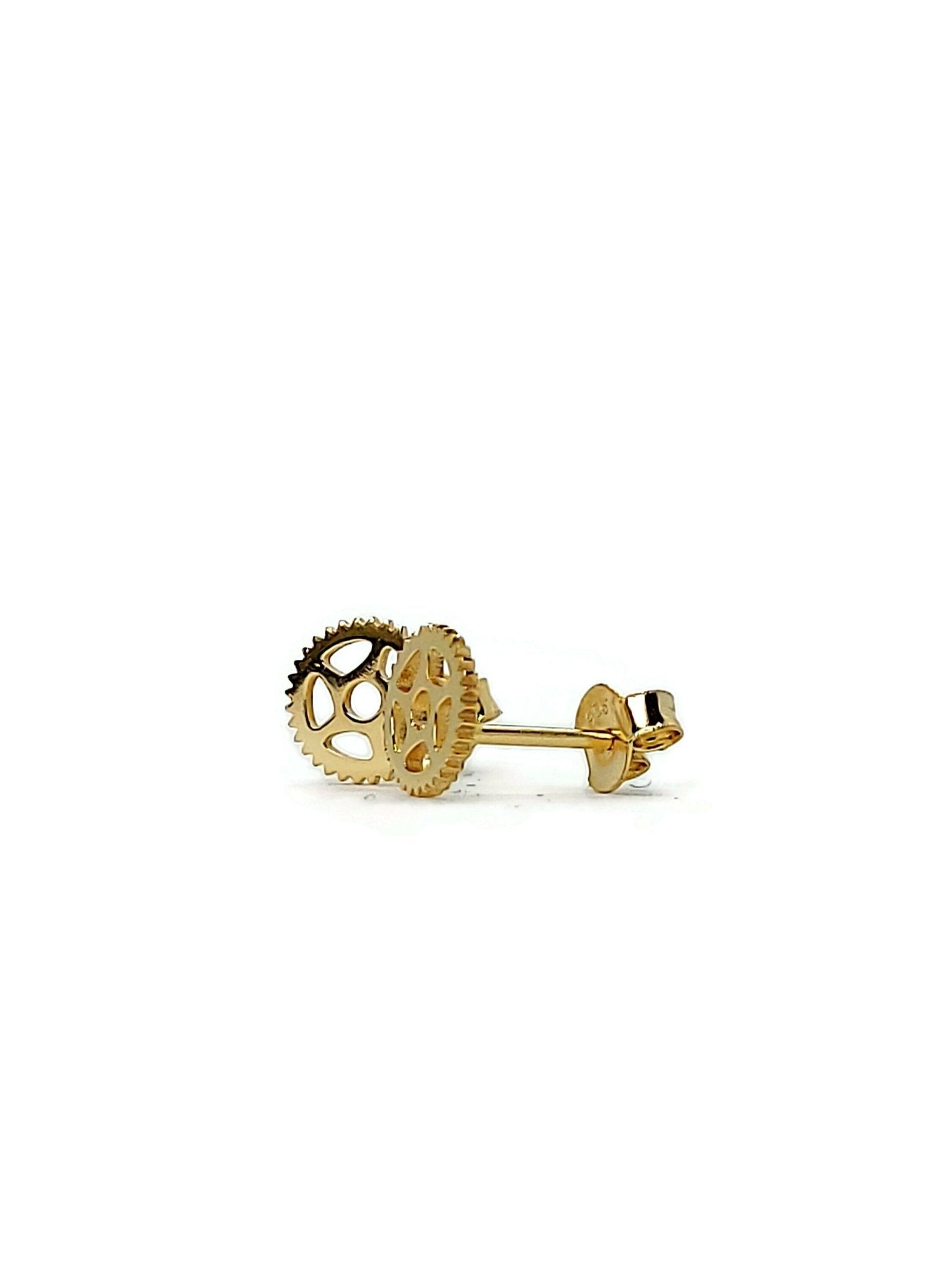 small bike gear post earrings in gold on white background_2
