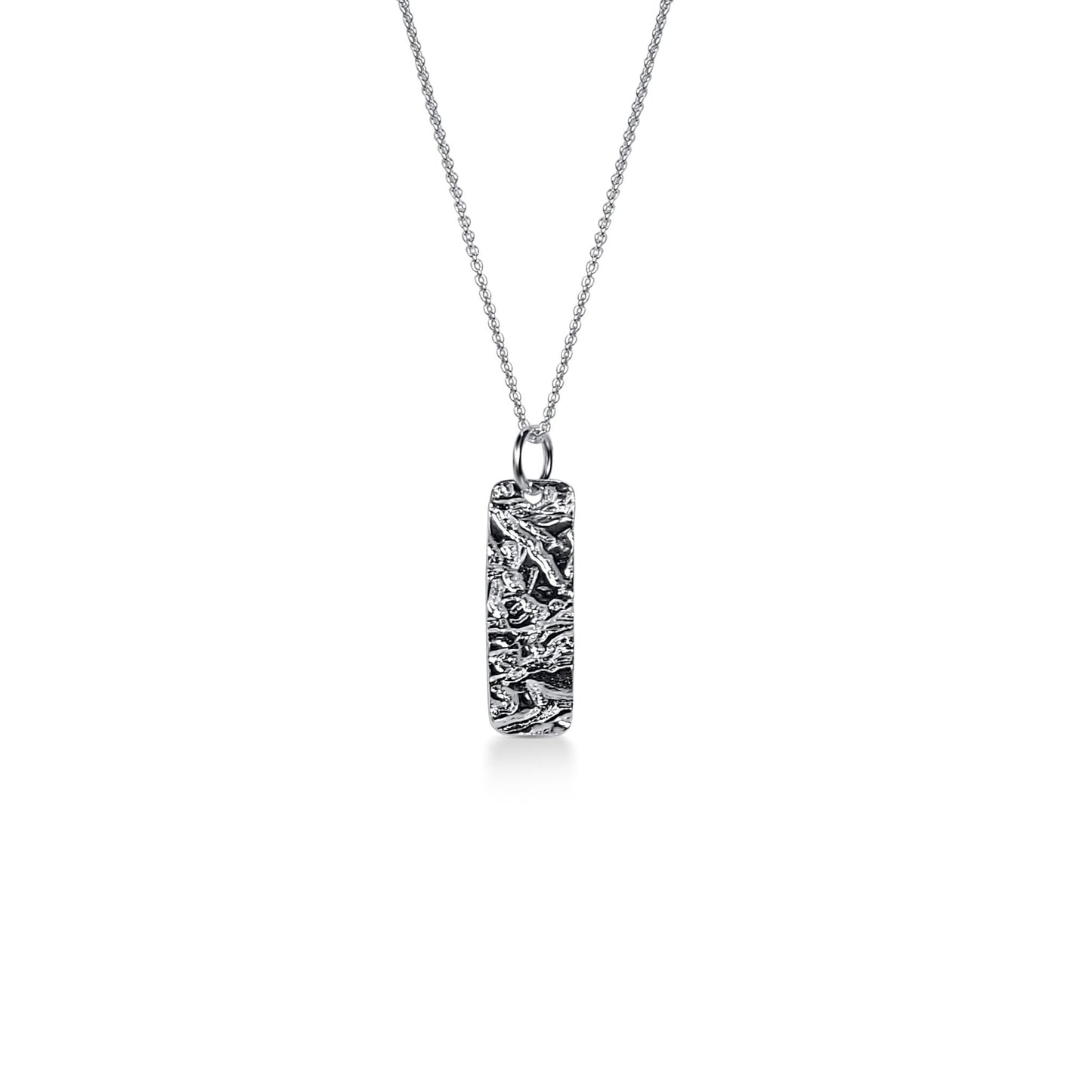 natural driftwood textured minimalist sterling silver rectangle pendant necklace on matching silver chain necklace