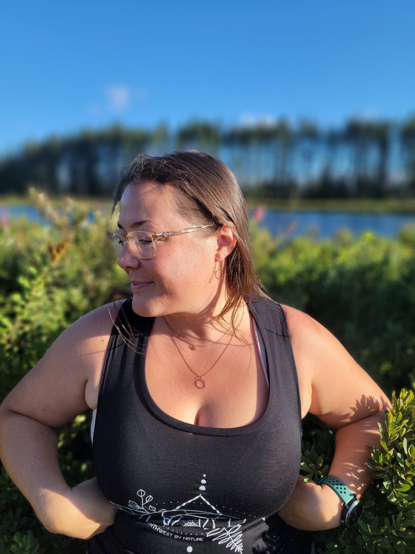 model in nature wearing layered hexagon Melina and Melita necklaces on rose gold vermeil