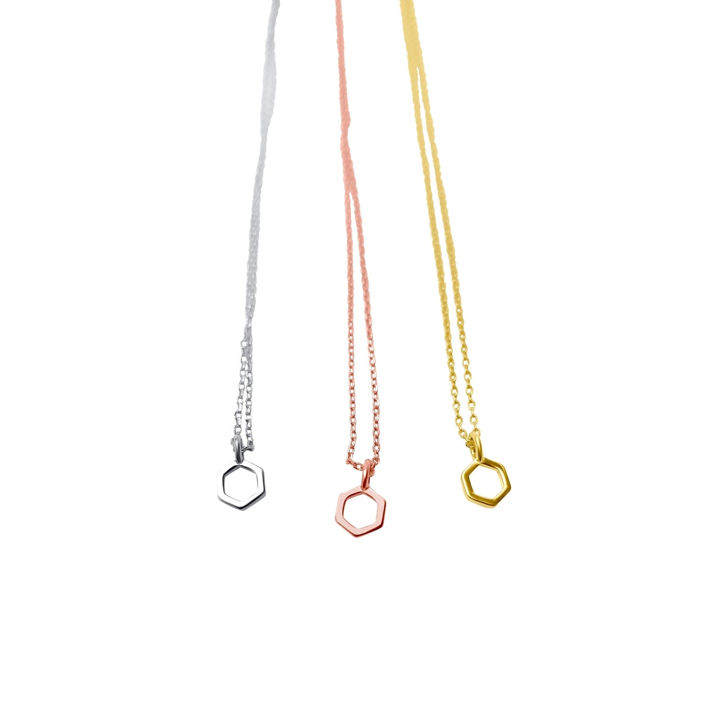 trio of mini hexagon pendant necklaces in silver, rose god and gold