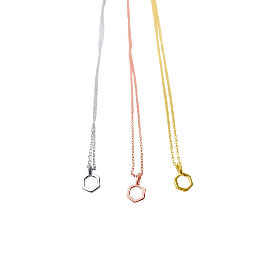 trio of mini hexagon pendant necklaces in silver, rose god and gold