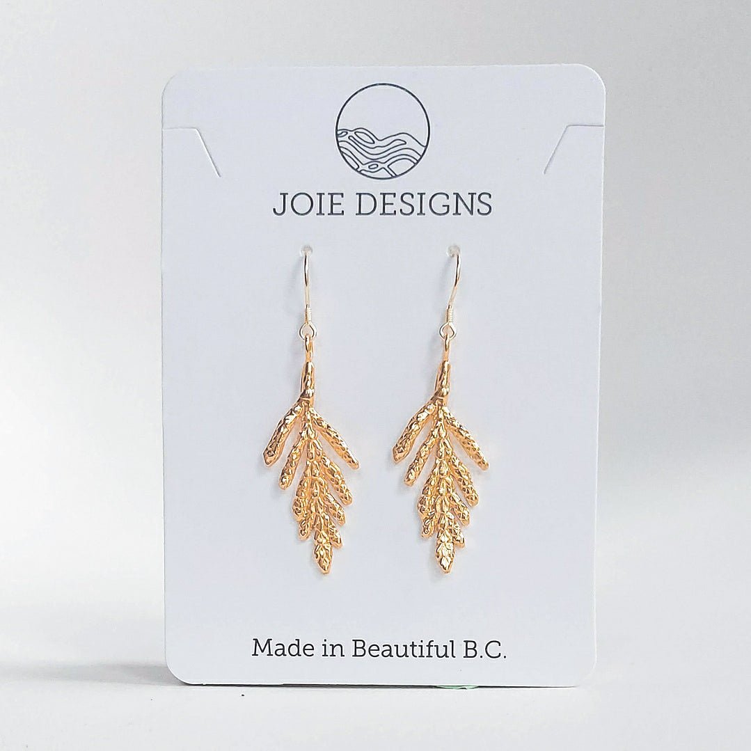 18k gold plated cedar leaf  Petite arborvitae Earrings dangle earrings on a jewelry card