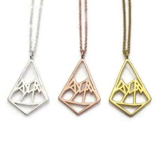 gold and rhodium plated 925 sterling silver  geometric mountains diamond shape pendant necklace on a white background