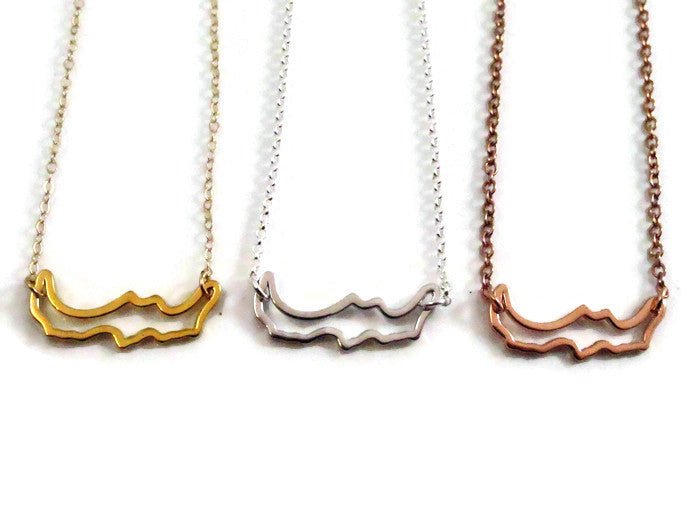 3 sterling silver petite Simply Savary necklaces in gold, rose gold and silver  on white back ground
