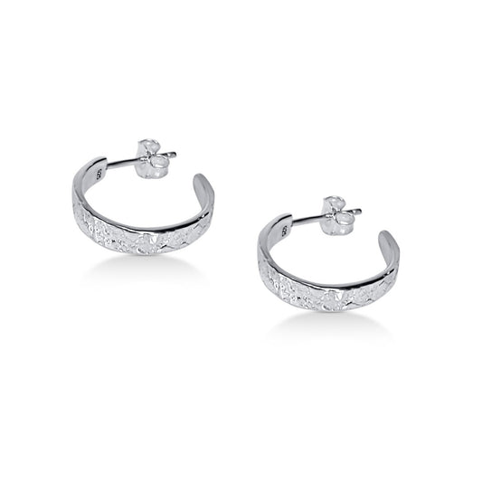 naturally textured sterling silver hoop earrings on post