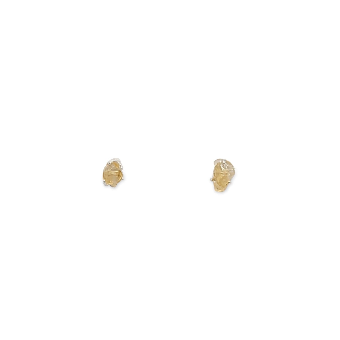 tiny, raw citrine gemstones nestled on secure sterling silver posts and backs