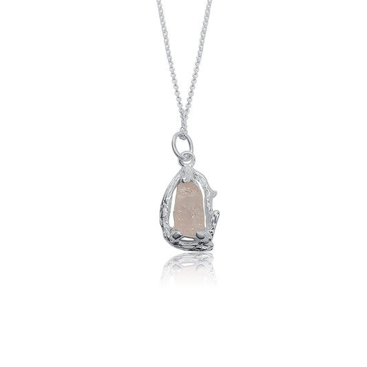 silver branch wrapped around rose quartz stone wit prong setting