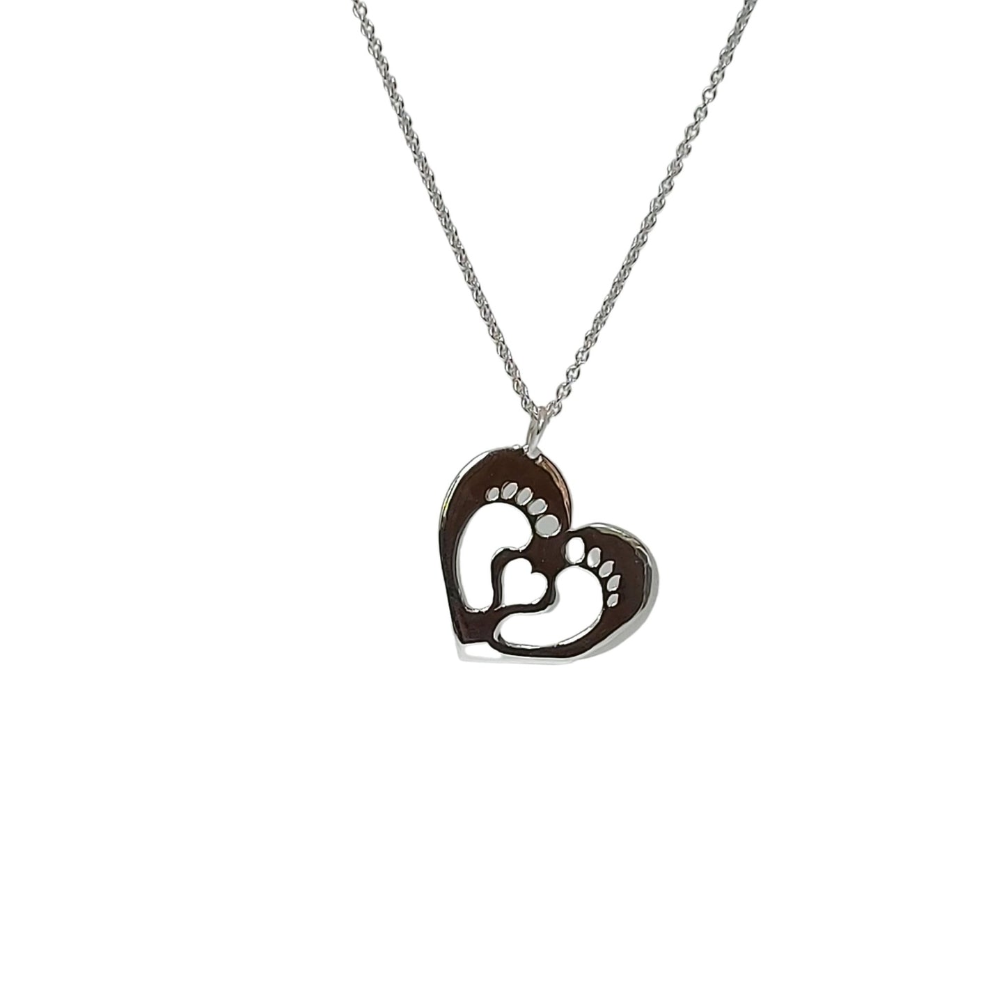 Clubfoot strong necklace. Stirling silver heart pendant with two feet and heart cut out