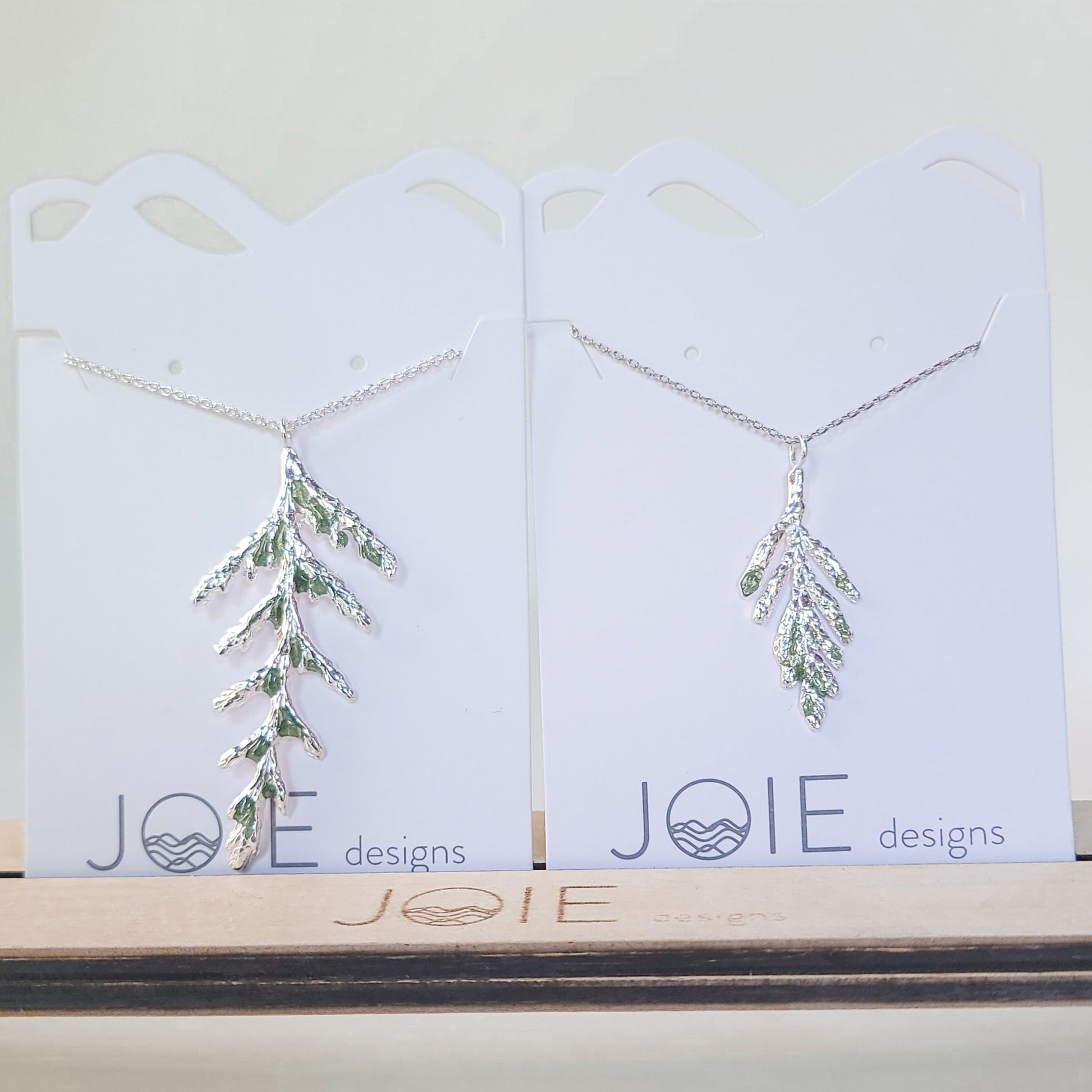 Silver petite  Arborvitae and Thuja Pendant necklaces embellished with with emerald green resin detailing