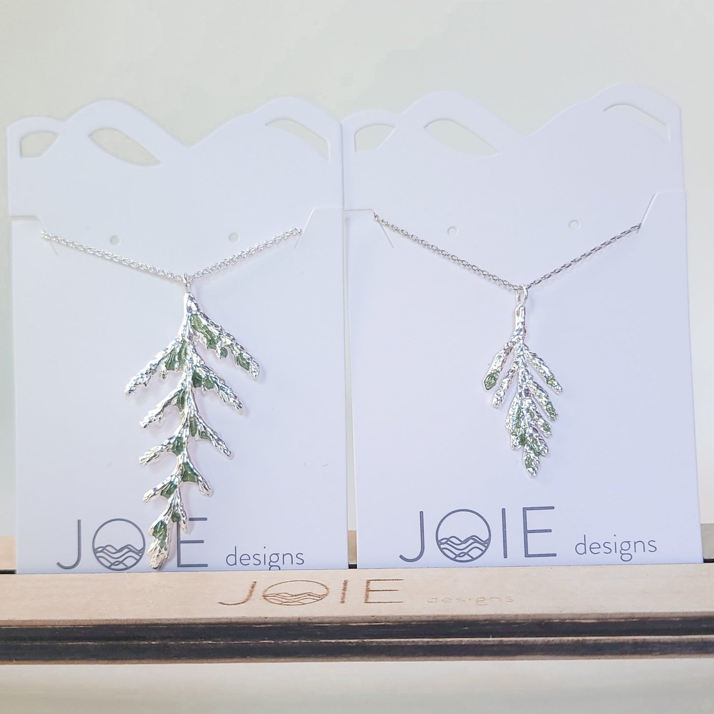 Embellished Silver Thuja and Petite Arborvitae Cedar Leaf Necklaces with green resin detailing