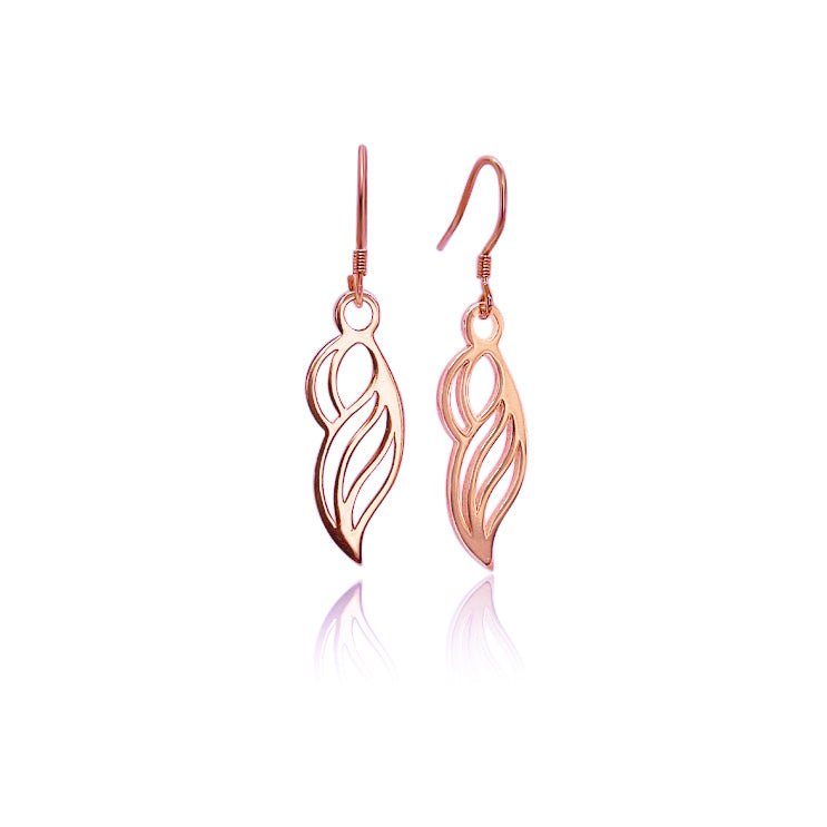 18k rose  gold vermeil earrings on french ear wires. Organic form that resembles a woman, a wave, or a wing.