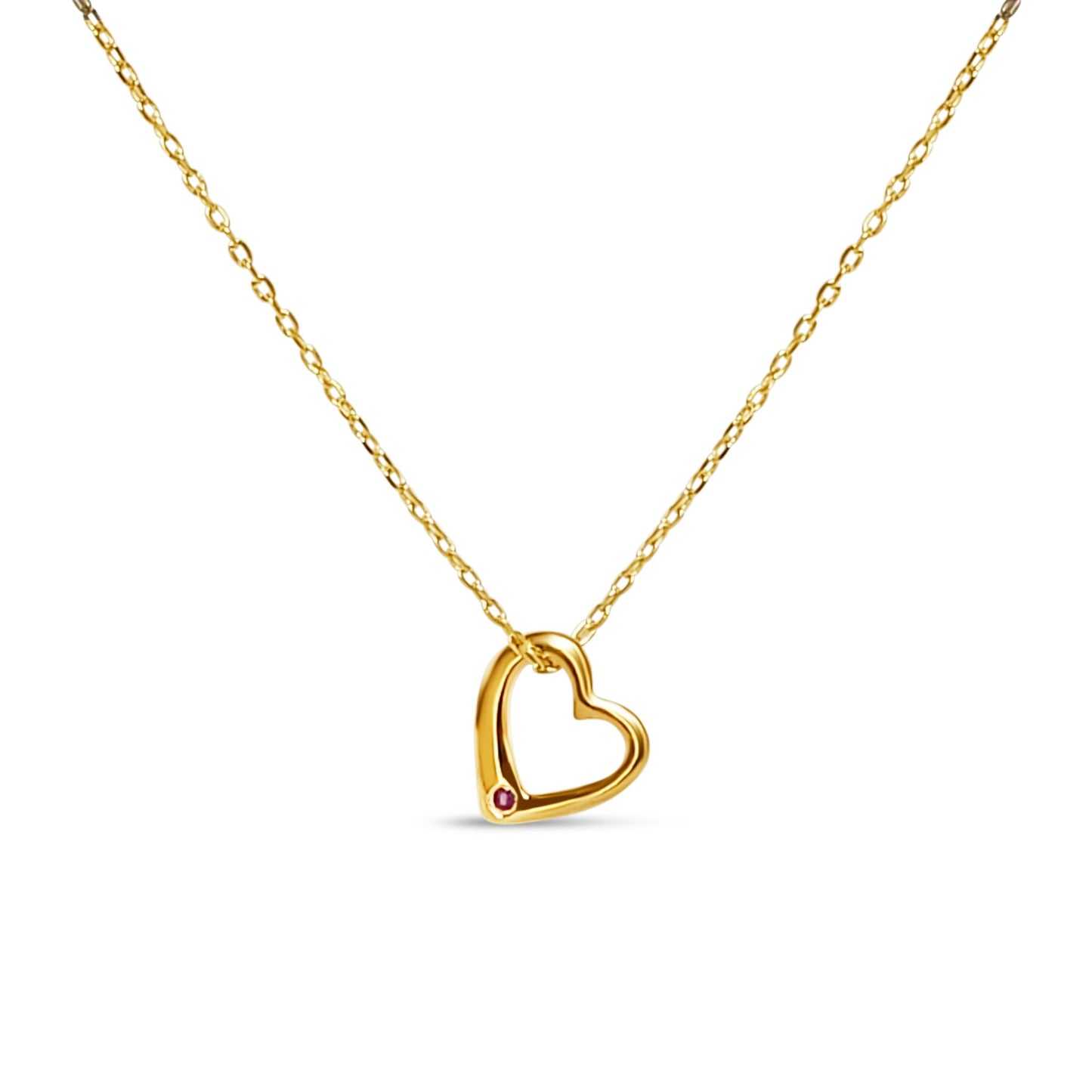 Gold heart pendant necklace with a precious ruby gemstone for a touch of elegance.