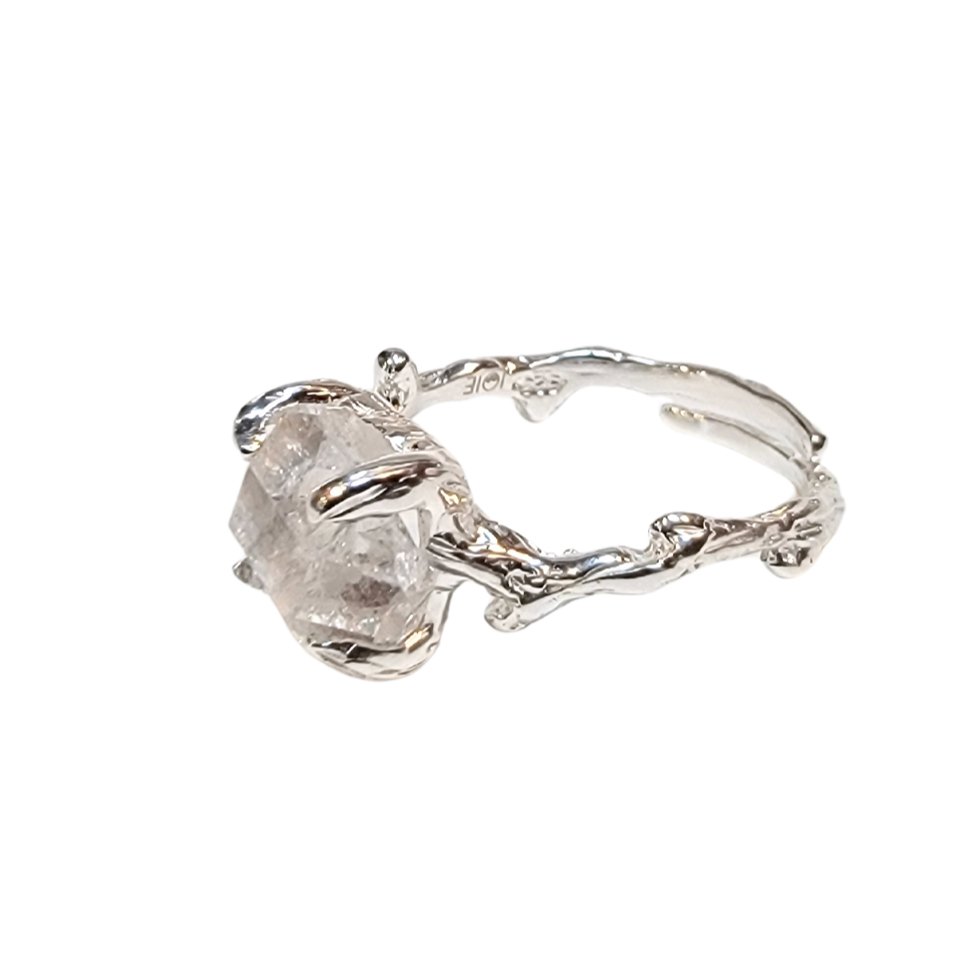 Silver branch ring with raw herkimer Diamond Quartz gemstone facing left