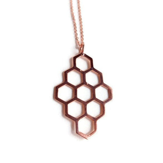 18k rose gold plated honeycomb diamond design pendant necklace with white background
