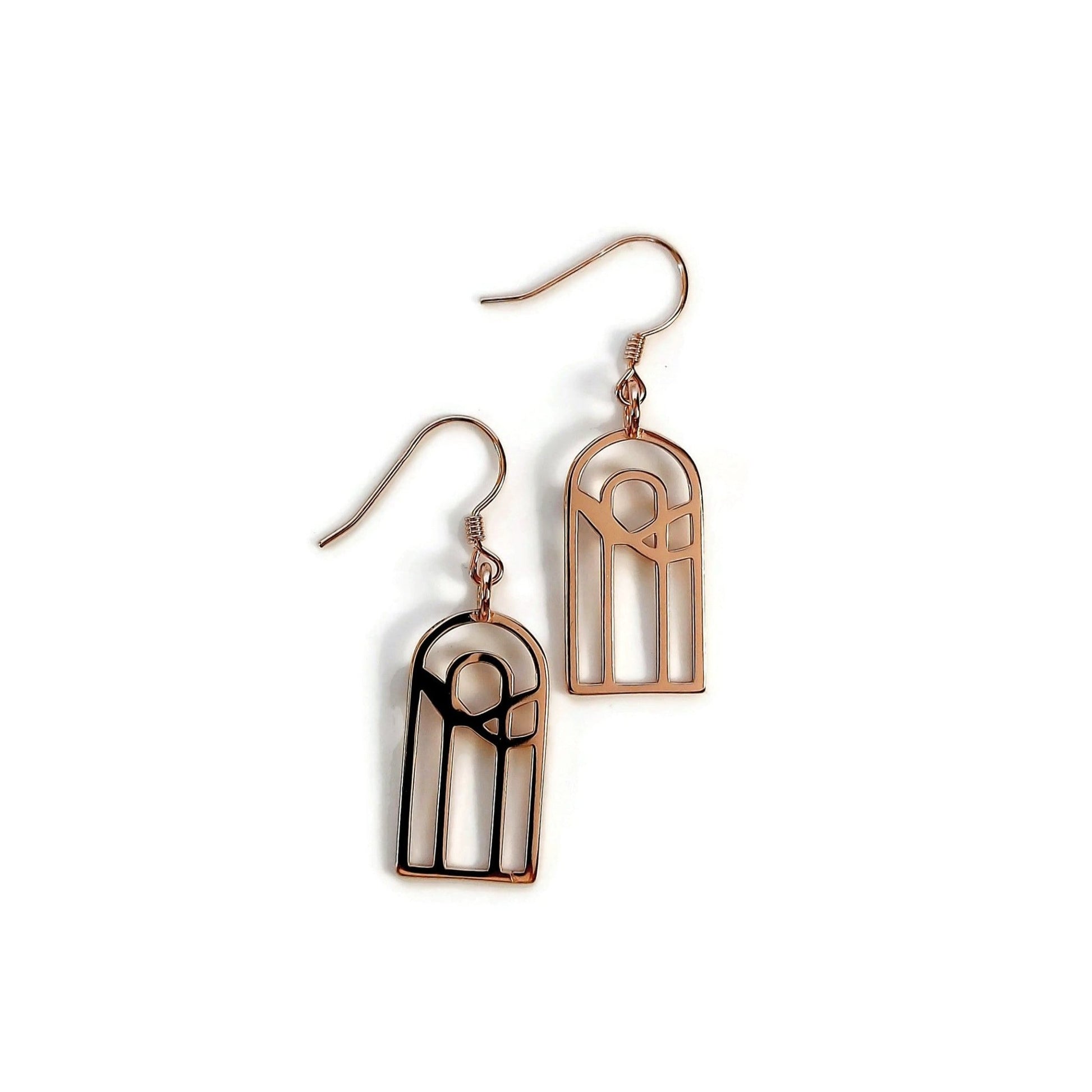 18k rose gold plated kaya rainbow design with water pattern earrings on white background