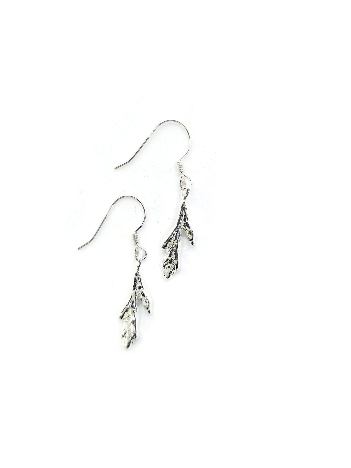 925 sterling silver little cedar leaf design earrings on white background