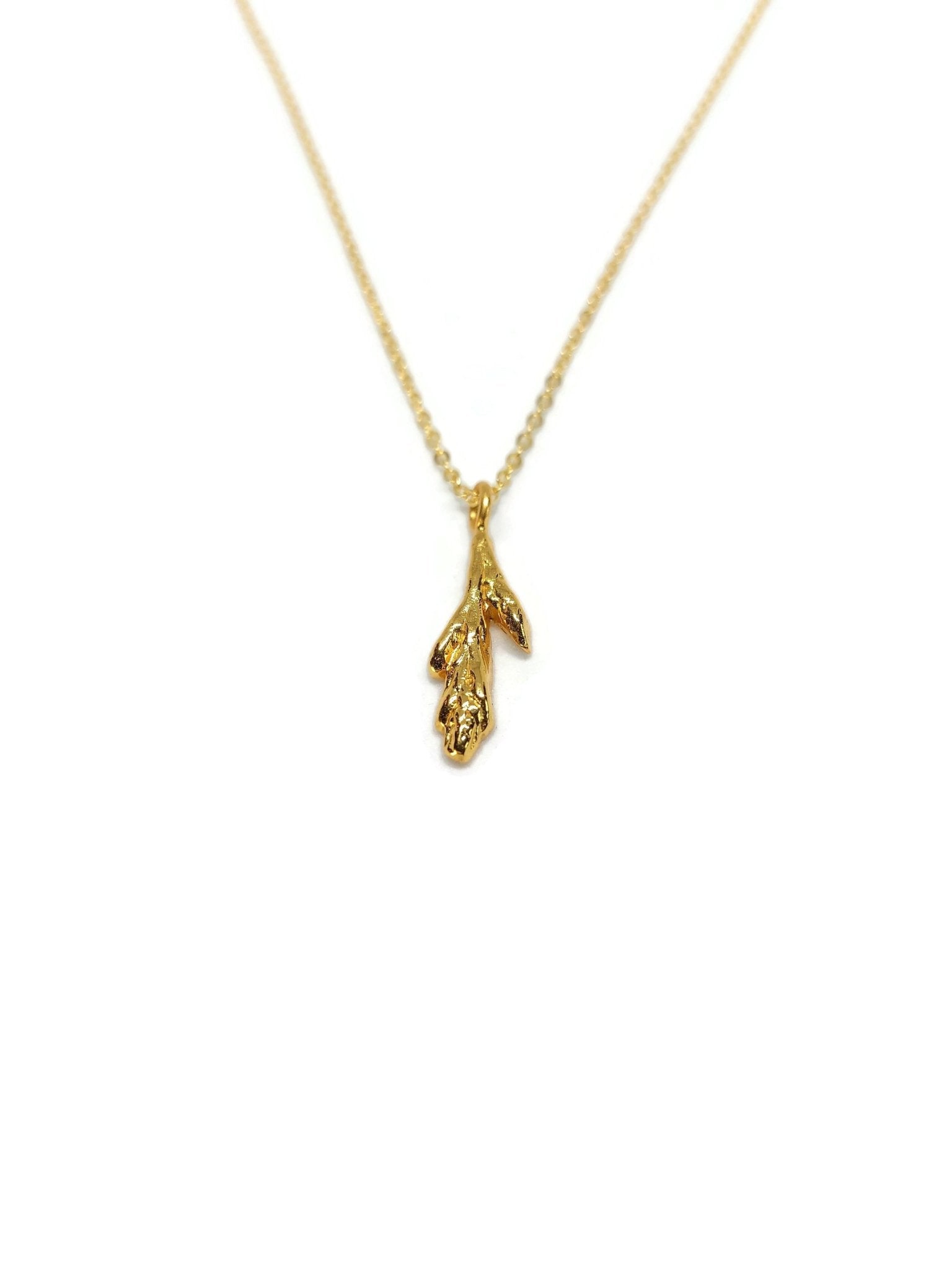 18k yellow gold plated little cedar leaf design pendant necklace on white background - 2