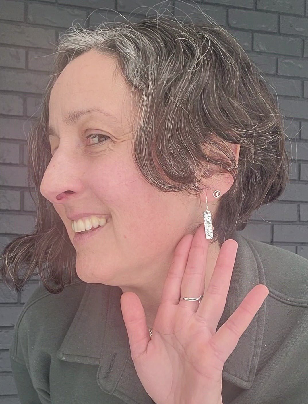 me wearing nature inspired earrings for women with driftwood texture