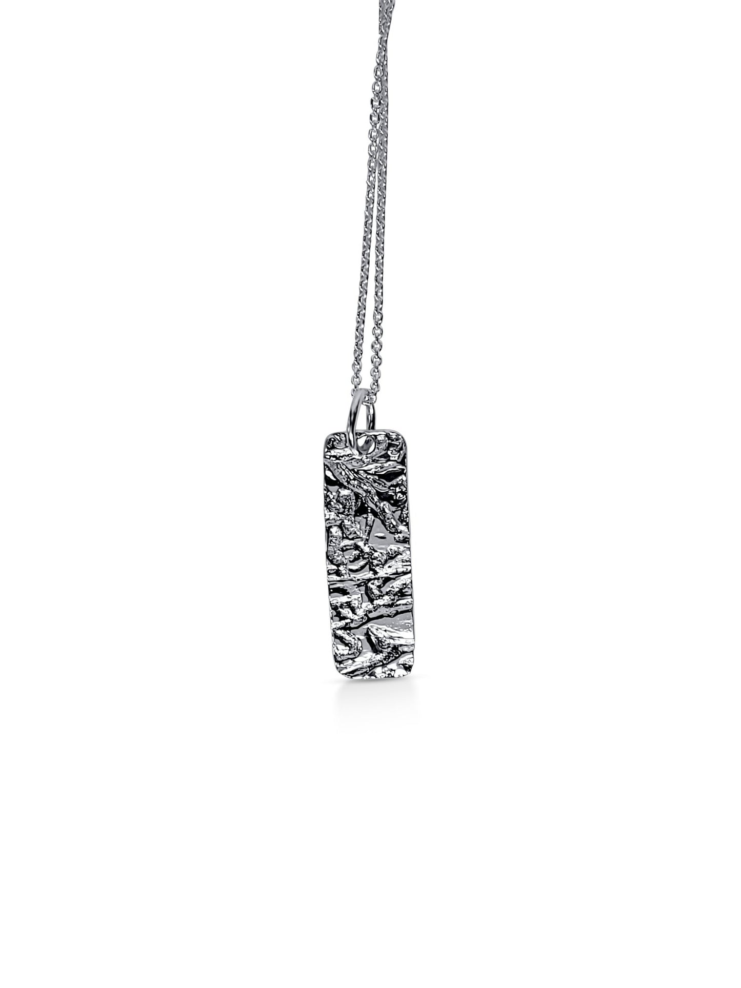 driftwood natural texture minimalist sterling silver rectangle pendant necklace on matching silver chain necklace