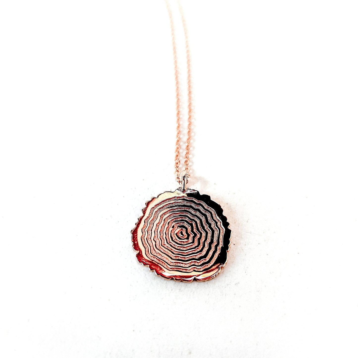 18k rose gold  plated sterling silver vita tree rings design with center heart pendant necklace on white background