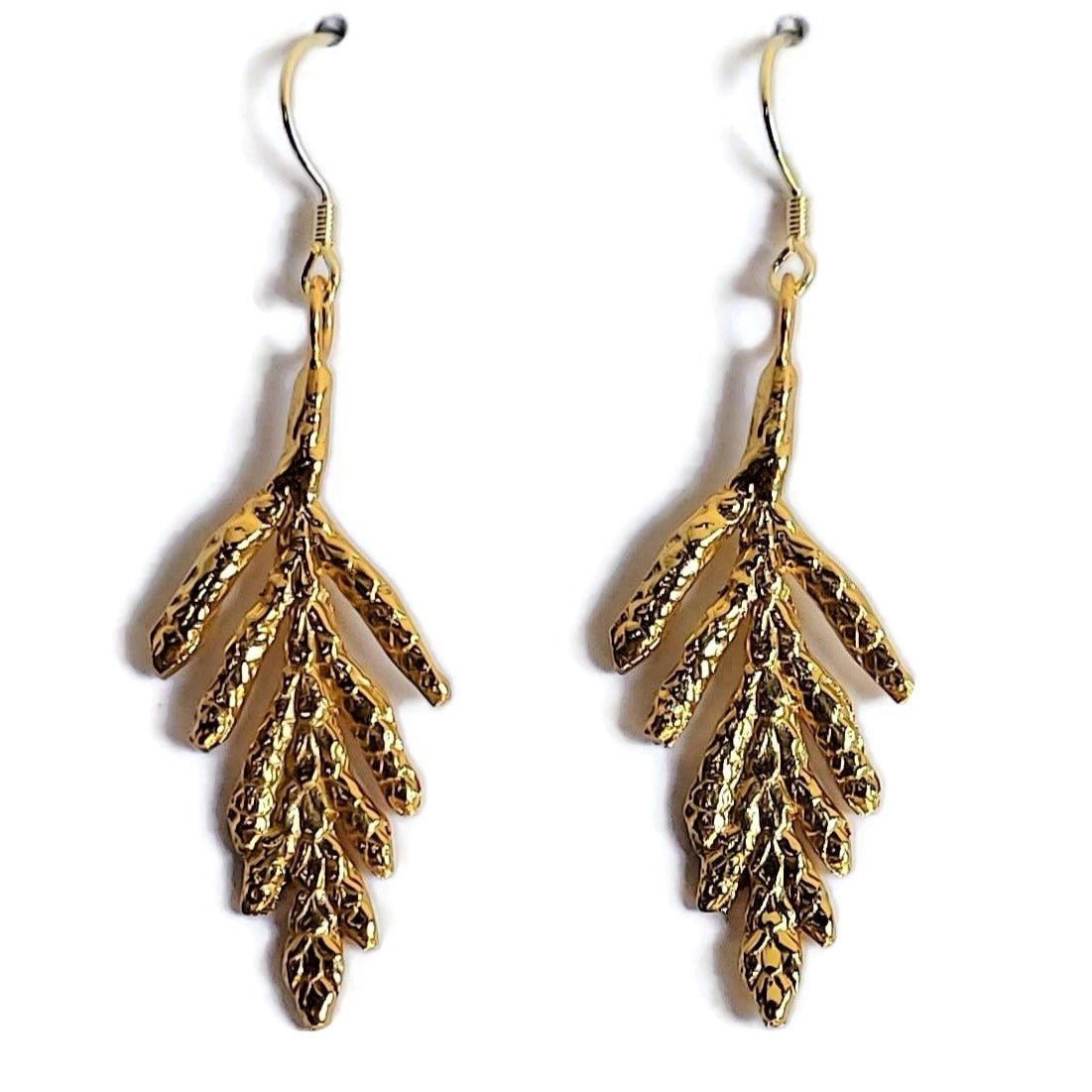 18k rose gold plated cedar leaf Petite arborvitae dangle earrings on a white background