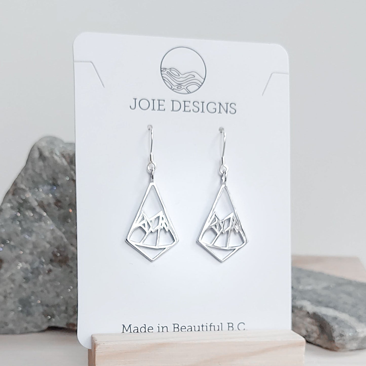 925 sterling silver petite geo mountain design dangle earring on a jewelry card