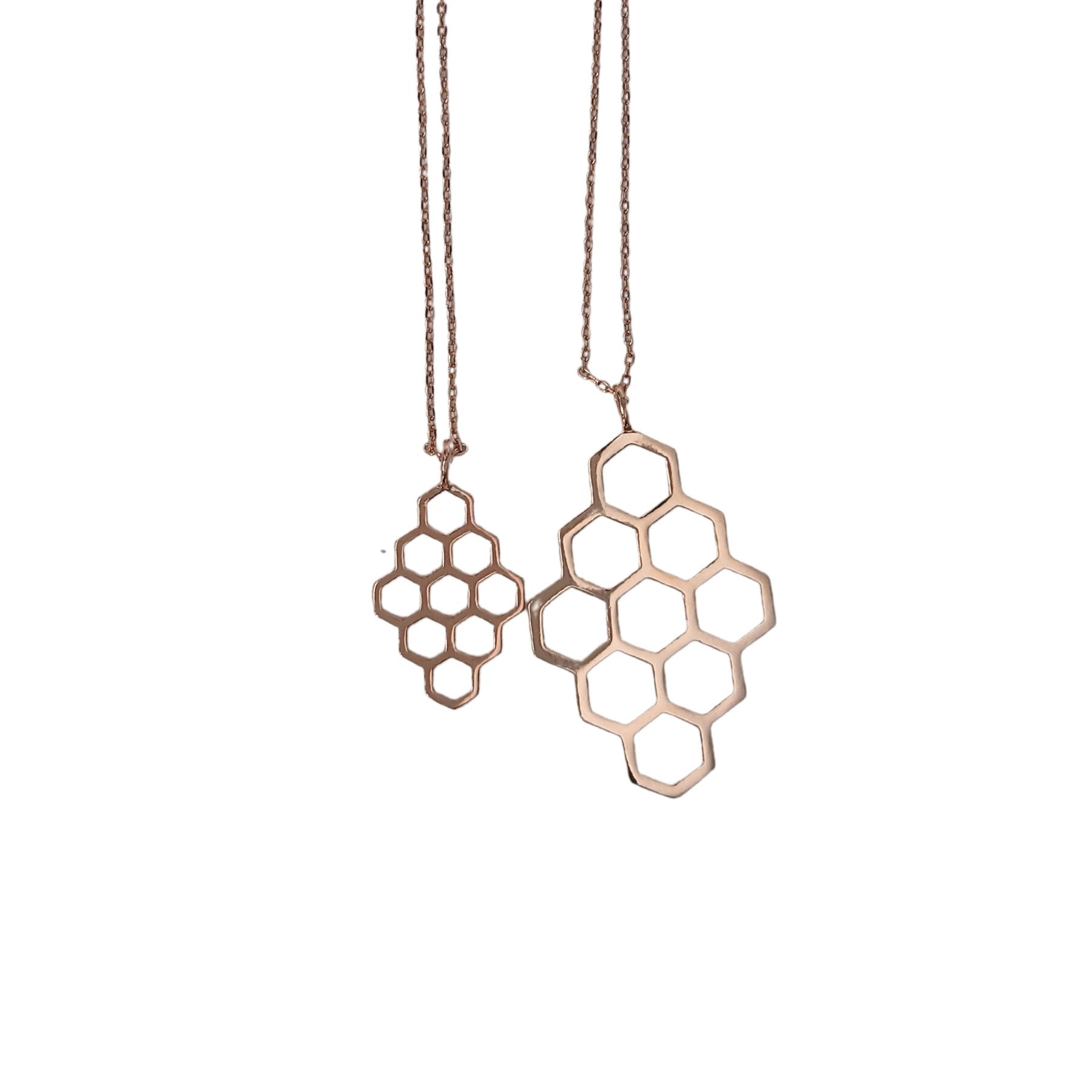 side by side size comaprison of Honeycomb and Petite Honey comb necklaces in rose gold on matching necklace chains