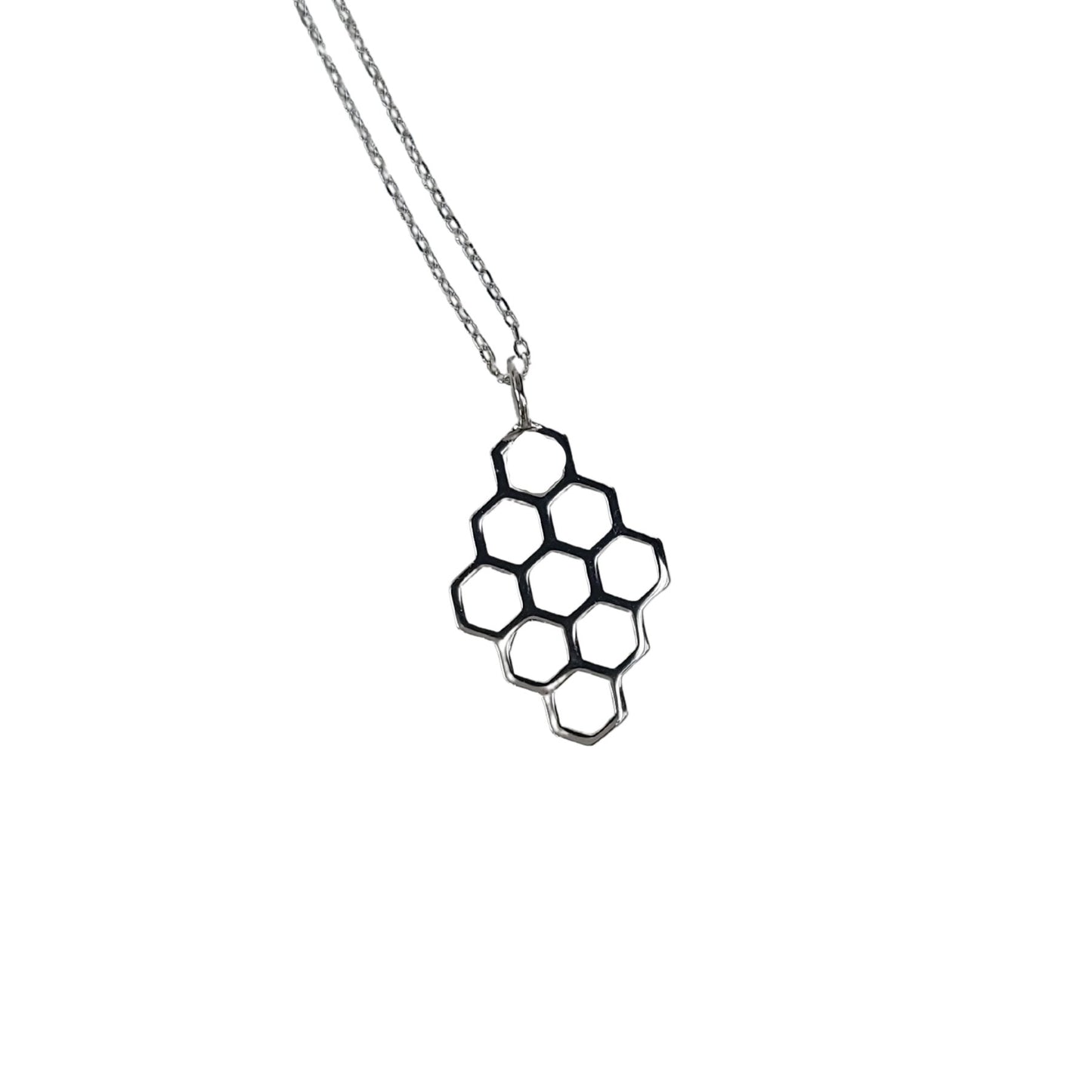 9 hexagons forming diamond shaped pendant. Silver petite honeycomb pendant necklace