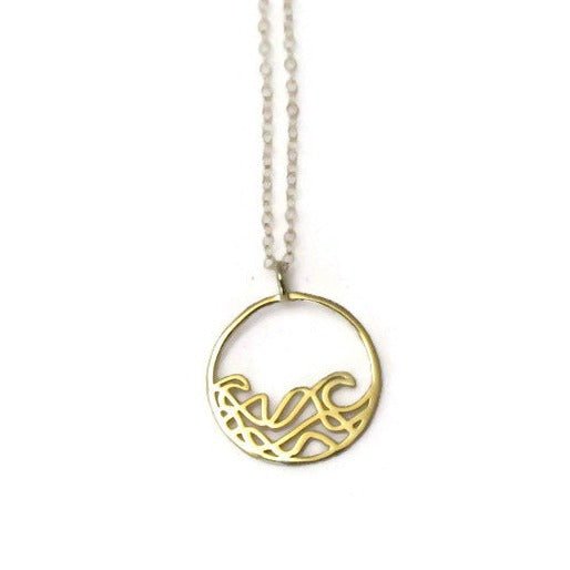 18k gold plated Petite Sombrio Ocean Surf Wave Circle Necklace on a white background