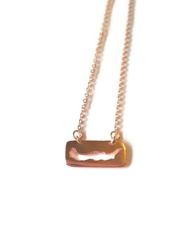 rose gold plated necklace featuring a cut-out of Savary Island in rectangle pendant charm