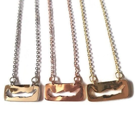 3 sterling silver and gold plated necklaces featuring a cut-out of Savary Island in rectangle pendant charm
