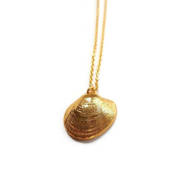 18k plated yellow gold clam seashell necklace on matching necklace chain, ocean jewelry