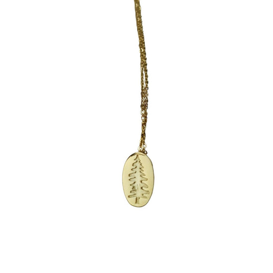 18k yellow gold plated Sitka Tree embossed into Oval Pendant Necklace hanging on white background