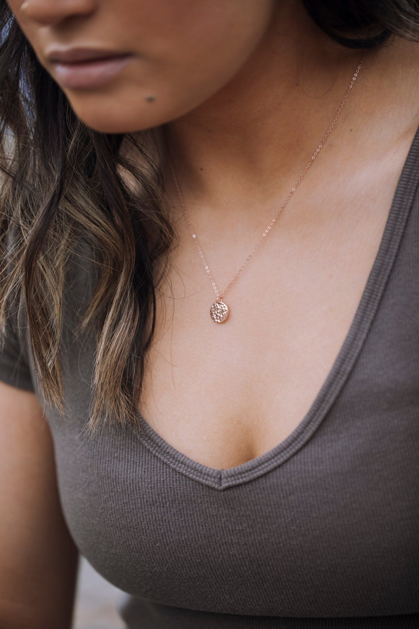 model wearing rose gold plated Sol Sun Inspired Small Circle Necklace closeup