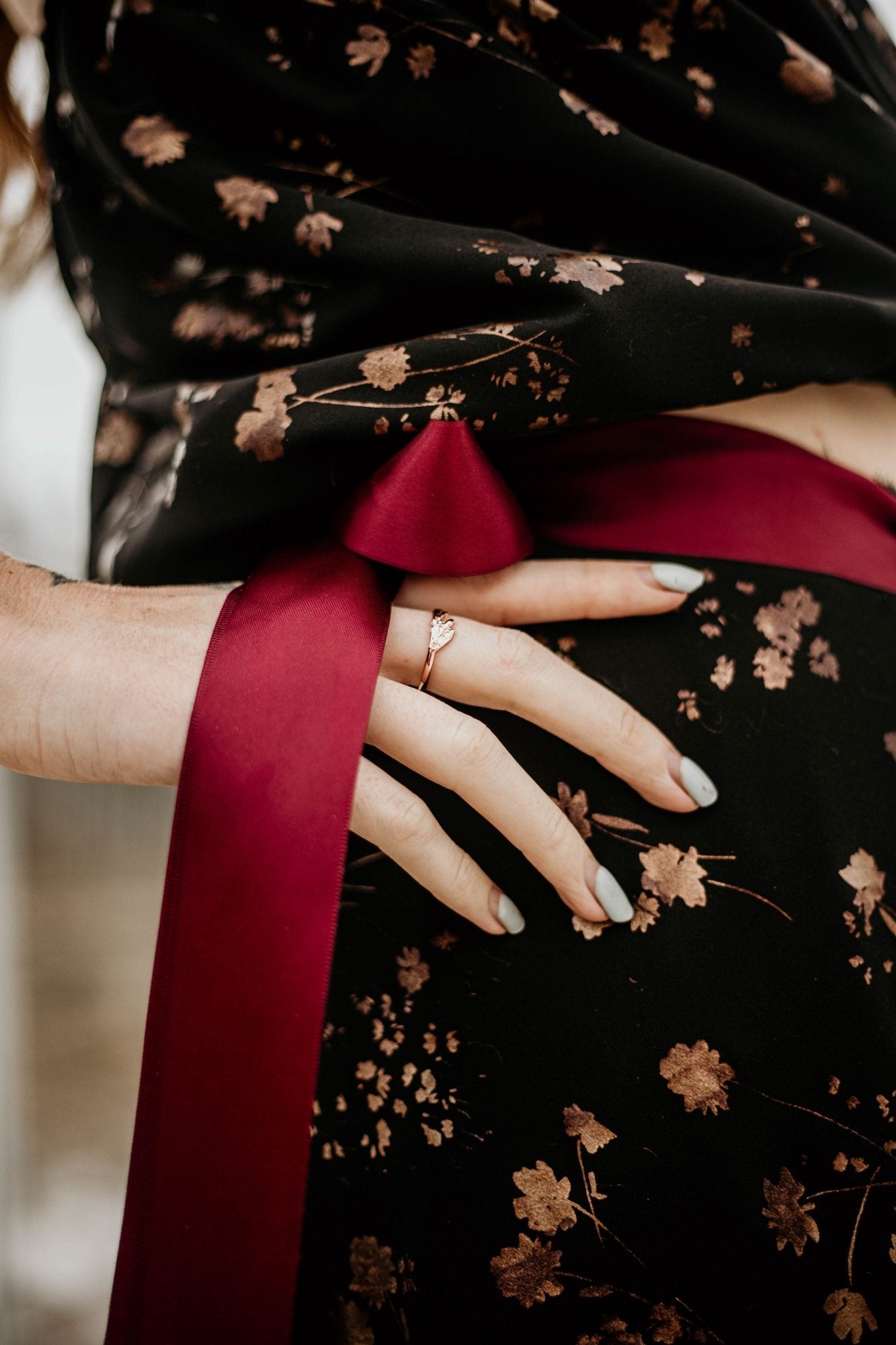 Unique botanical jewelry on model's hand: Cedar leaf cast in silver and gold plated for a stunning ring